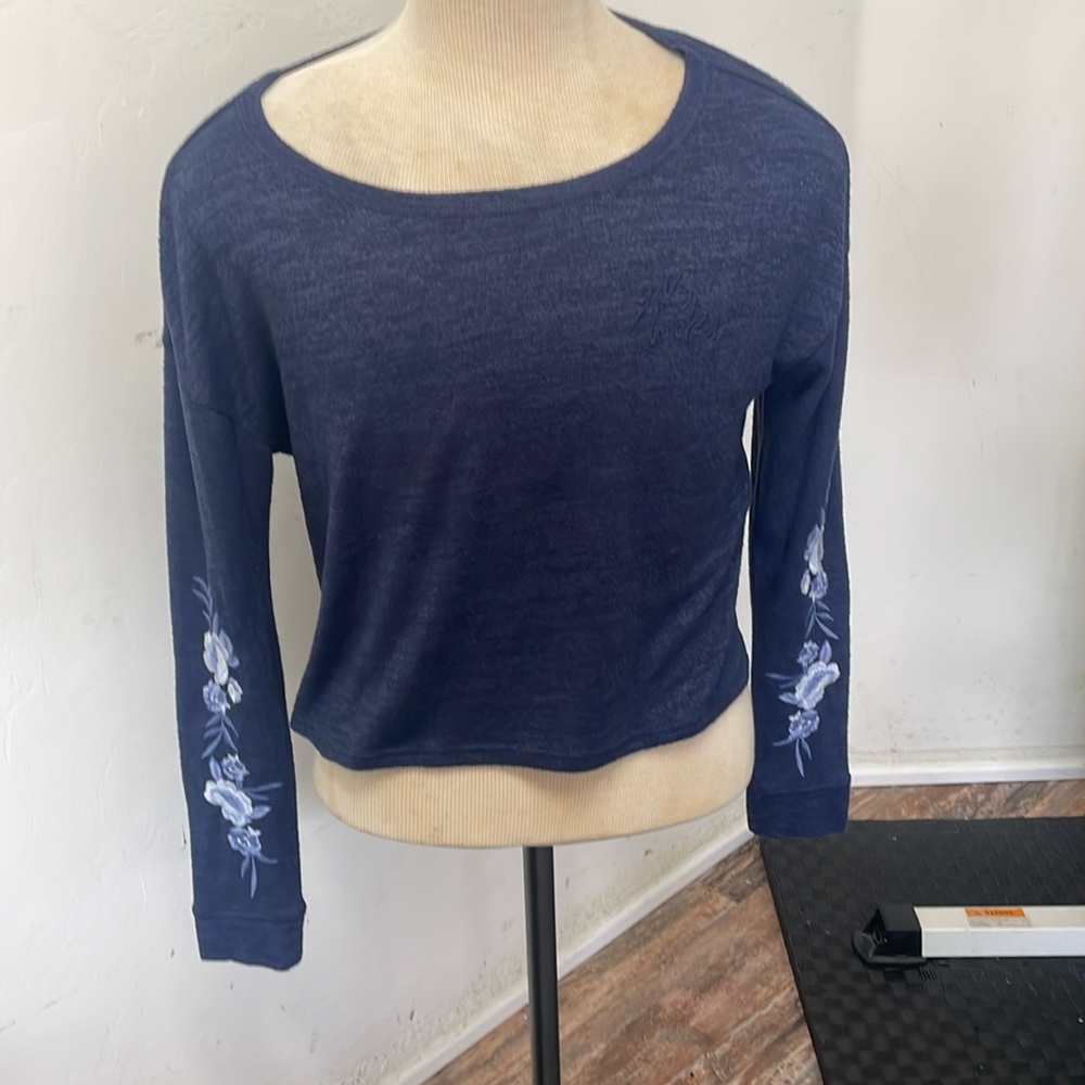 Gilly Hicks blue long sleeve with flowers on sleeves. size small